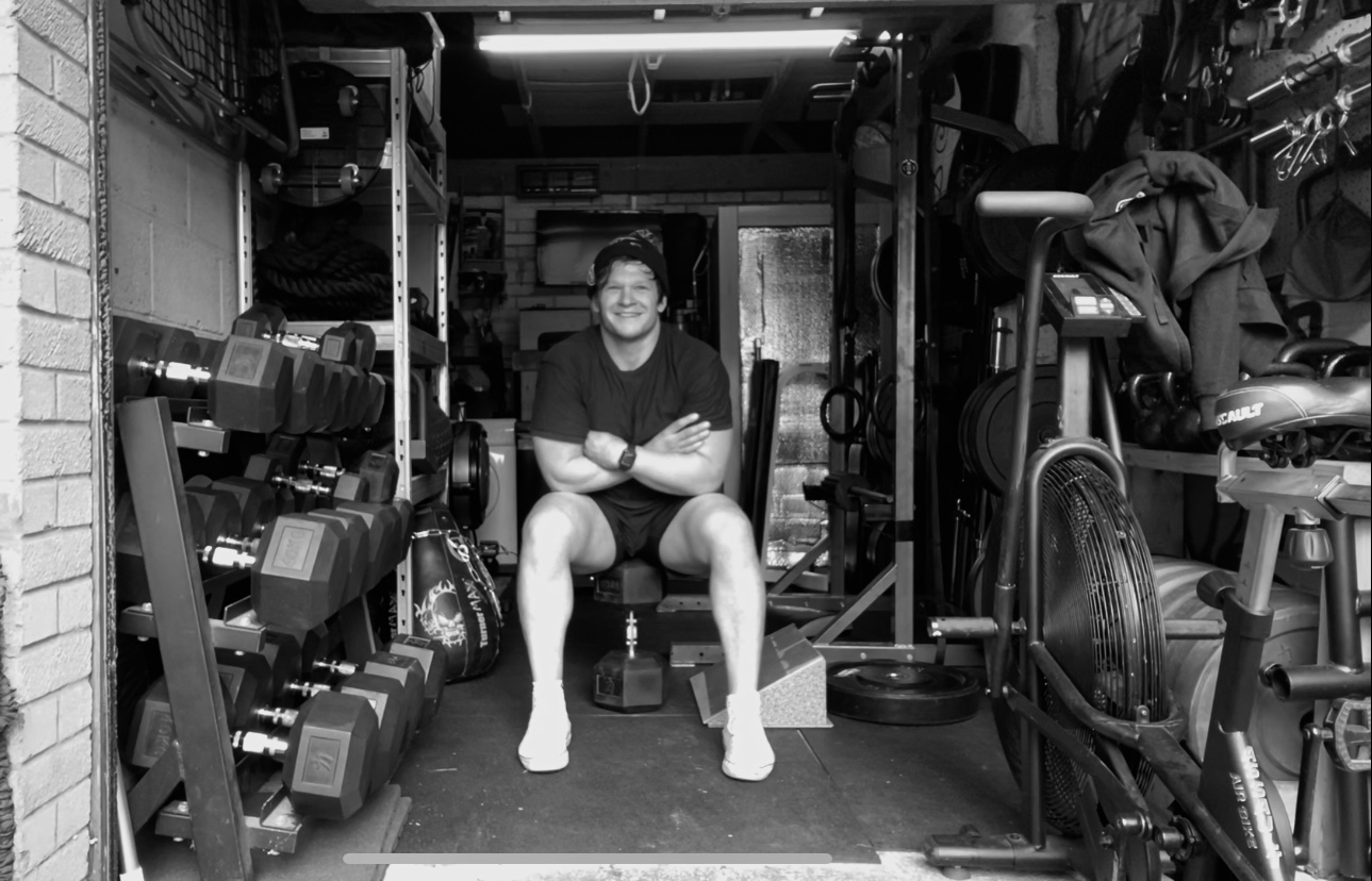 Darren in the original garage gym