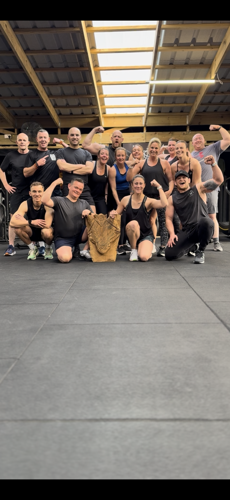 Awakening Strength members celebrating after a team training session